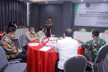 Sekda Aceh, Taqwallah membuka Rakor Sinergitas Peningkatan Kesiapsiagaan Penanggulangan Bencana Karhutla di Aceh, Senin (13/7) di Hotel Kyriad Muraya