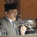 Plt Asisten II Setda Aceh Mawardi memberikan penjelasan terkait anggaran PON 2024 pada Rapat Paripurna di Gedung Utama DPRA, Sabtu (30/9)