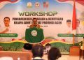 Asisten II Setda Aceh Ir Mawardi menyampaikan sambutan sekaligus membuka Workshop Penguatan kelembagaan dan kemitraan kelapa sawit rakyat Provinsi Aceh, di Hotel Grand Arabia Banda Aceh, Selasa, 6 Mei 2024. (Foto: Dok. Biro Adpim Setda Aceh)
