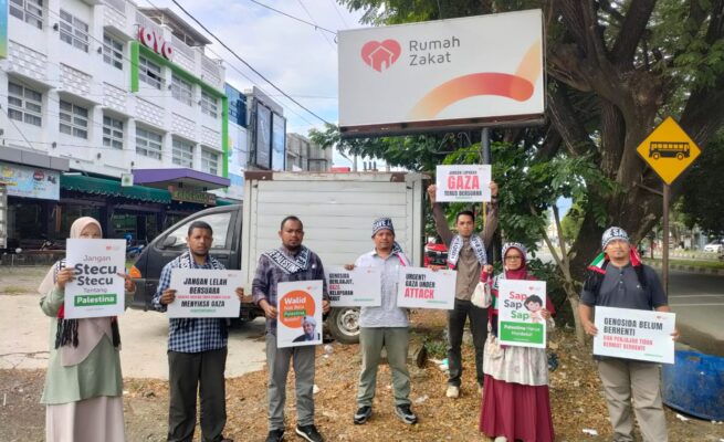 Memperingati 77 tahun Peristiwa Nakba, Rumah Zakat Aceh menggelar aksi solidaritas untuk Palestina, Kamis (15/5). (Foto: For Infoaceh.net)
