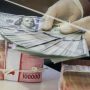 Nilai tukar rupiah terhadap dolar AS dibuka menguat tipis dalam perdagangan pasar spot Selasa, 10 Juni 2025.