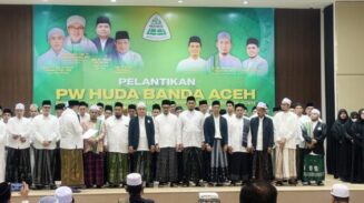 PW HUDA Kota Banda Aceh resmi dilantik masa khidmat 2025–2030 di auditorium lantai 8 Gedung Landmark BSI Aceh, Senin malam (16/6). (Foto: For Infoaceh.net)