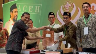 Wagub Aceh Fadhlullah atau Dek Fad terpilih aklamasi sebagai Ketua Kwarda Pramuka Aceh periode 2025-2030 dalam Musda ke-10, di Ballroom The Pada Hotel, Kamis (19/6). (Foto: For Infoaceh.net)