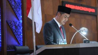 Plt. Sekda Aceh M Nasir Syamaun menyampaikan Rancangan Qanun Aceh tentang Pertanggungjawaban APBA 2024 dalam rapat paripurna DPRA, Selasa (24 Juni 2025).