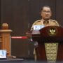Dirjen Otonomi Daerah Kemendagri Akmal Malik mewakili Pemerintah menyampaikan keterangannya dalam sidang pengujian Pasal 115 ayat (3) UUPA pada Senin (30/6/2025) di Ruang Sidang MK. (Foto: Ist)