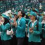 Para mahasiswa mengikuti acara pelepasan KKN Reguler XXVII dan KKN Tematik Literasi USK di Gedung AAC Dayan Dawood Darussalam, Banda Aceh, Selasa (1/7/2025). (Foto: Ist)