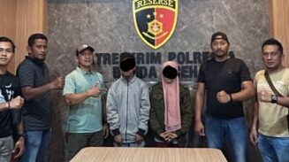 Seorang wanita paruh baya, ZU (33) warga salah satu Gampong di Pidie Jaya ditangkap Unit Jatanras Satreskrim Polresta Banda Aceh. Ia diduga melakukan pencurian uang Rp20 juta di TK Az – Zahra, Kuta Alam Banda Aceh. (Foto: Dok. Polresta Banda Aceh)